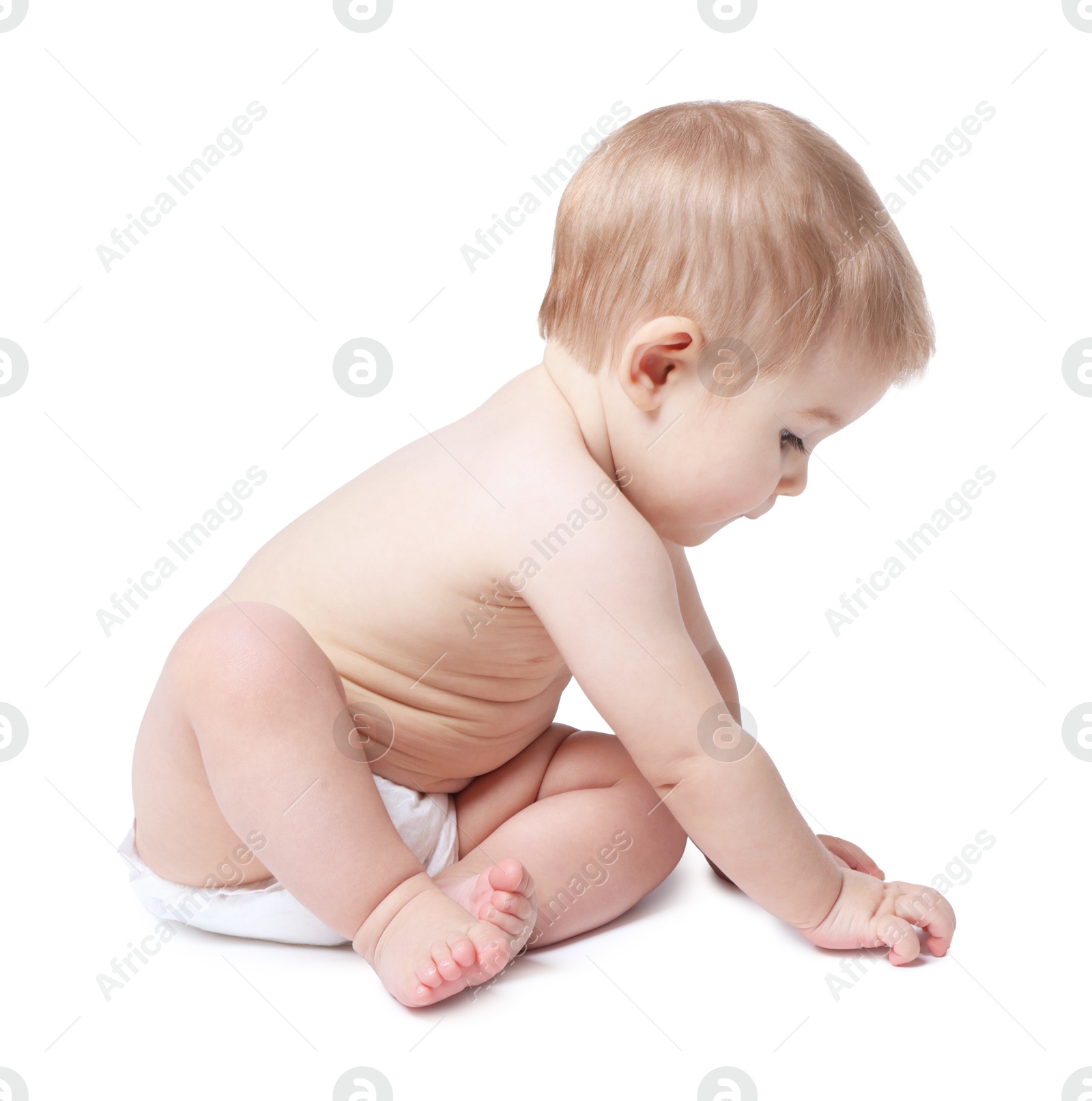 Photo of Cute little baby sitting on white background