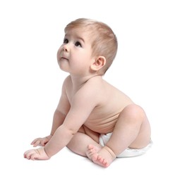 Cute little baby sitting on white background