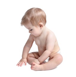 Cute little baby sitting on white background