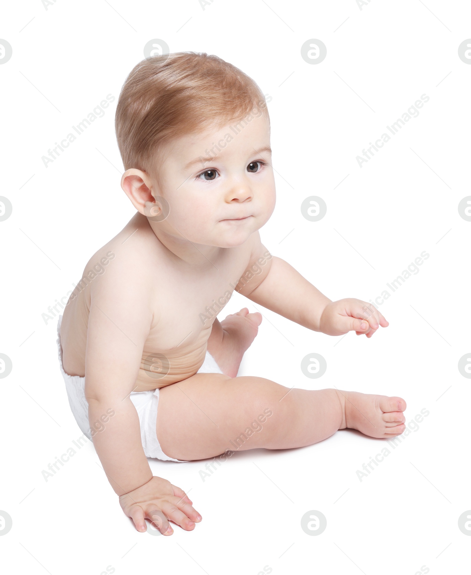 Photo of Cute little baby sitting on white background