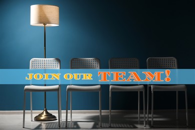 Image of Join our team! White chairs and lamp near blue wall. Human resource, recruitment concept