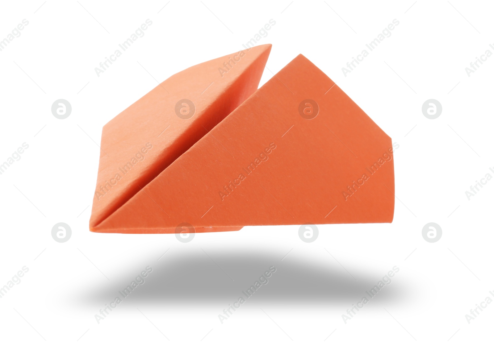 Image of Orange paper plane in air on white background