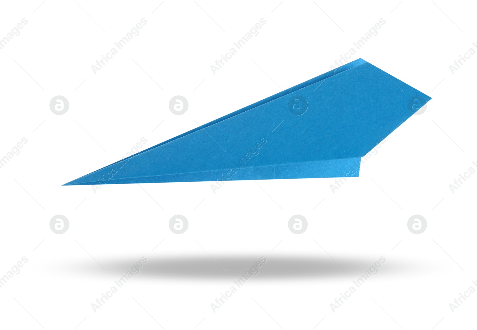 Image of Light blue paper plane in air on white background