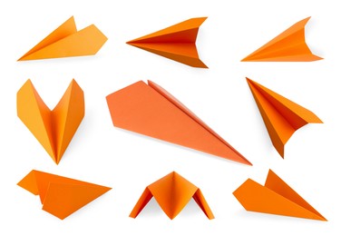 Image of Orange paper planes on white background, set