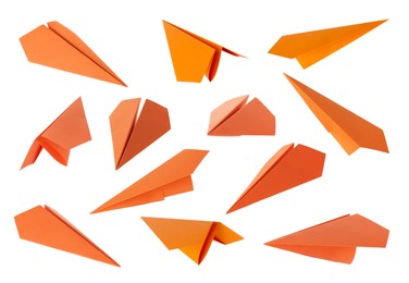 Image of Orange paper planes on white background, set