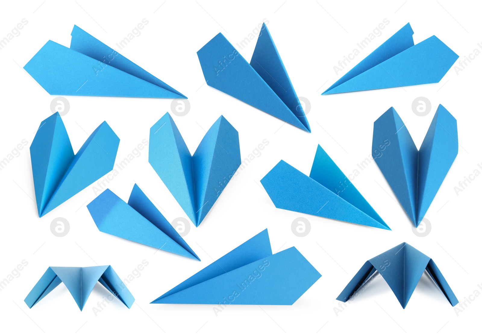 Image of Light blue paper planes on white background, set