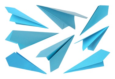 Image of Light blue paper planes on white background, set