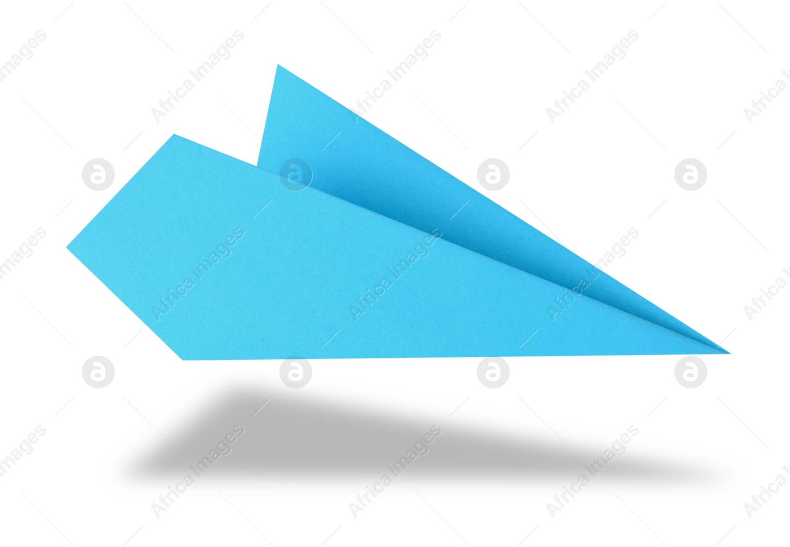 Image of Light blue paper plane in air on white background