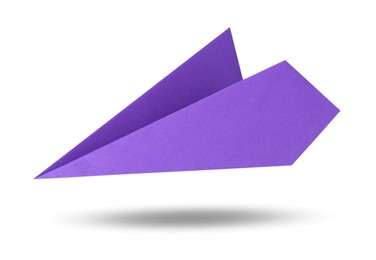 Image of Purple paper plane in air on white background