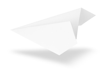 Image of Paper plane in air on white background