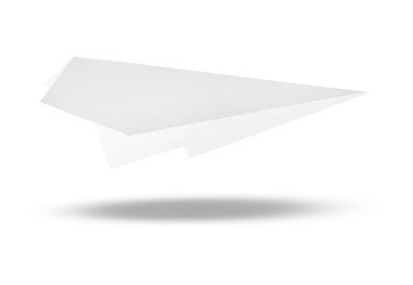 Image of Paper plane in air on white background