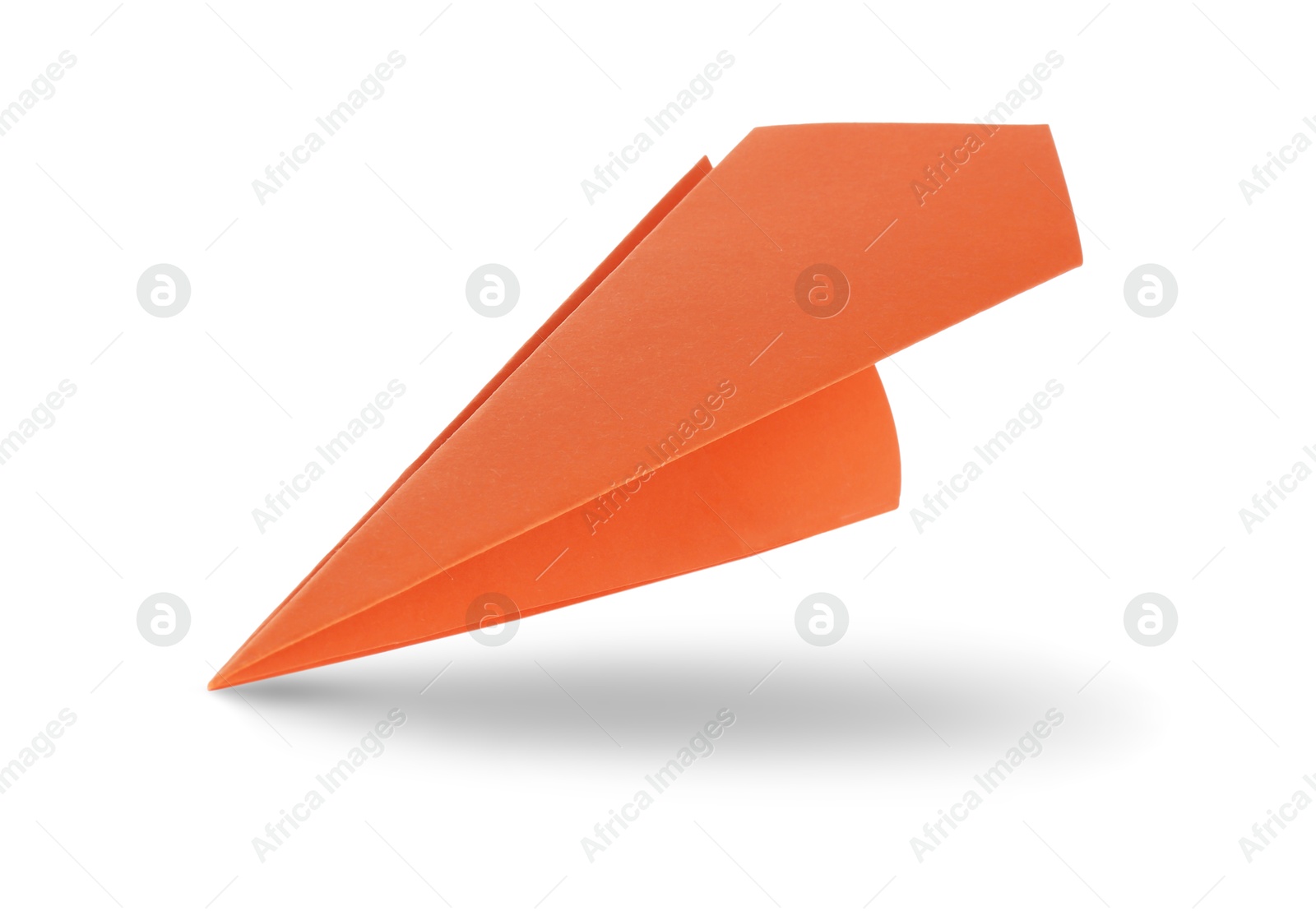 Image of Orange paper plane in air on white background