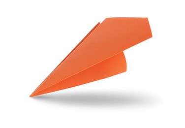 Image of Orange paper plane in air on white background