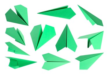 Image of Green paper planes on white background, set