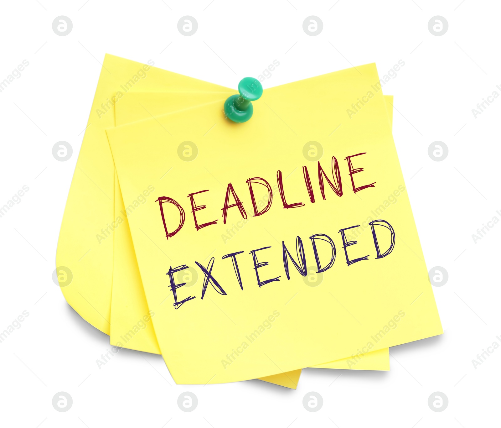 Image of Paper note with text Deadline Extended attached to white wall