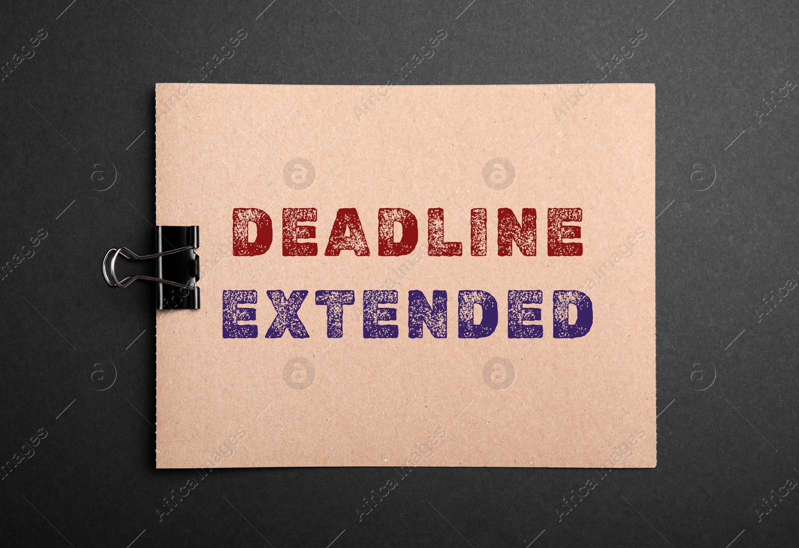 Image of Paper note with text Deadline Extended on black background