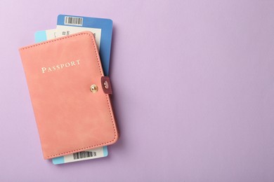 Photo of Passport with tickets on lilac background, top view. Space for text