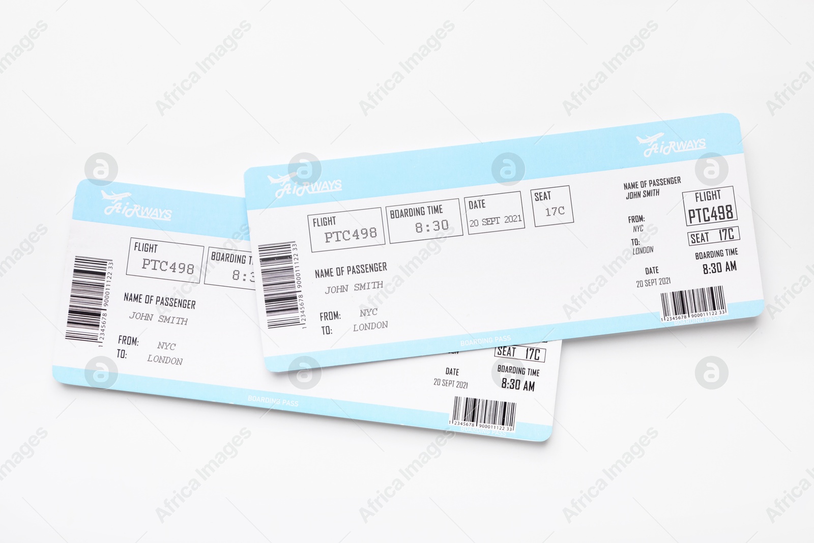 Photo of Travel agency. Flight tickets on light background, top view