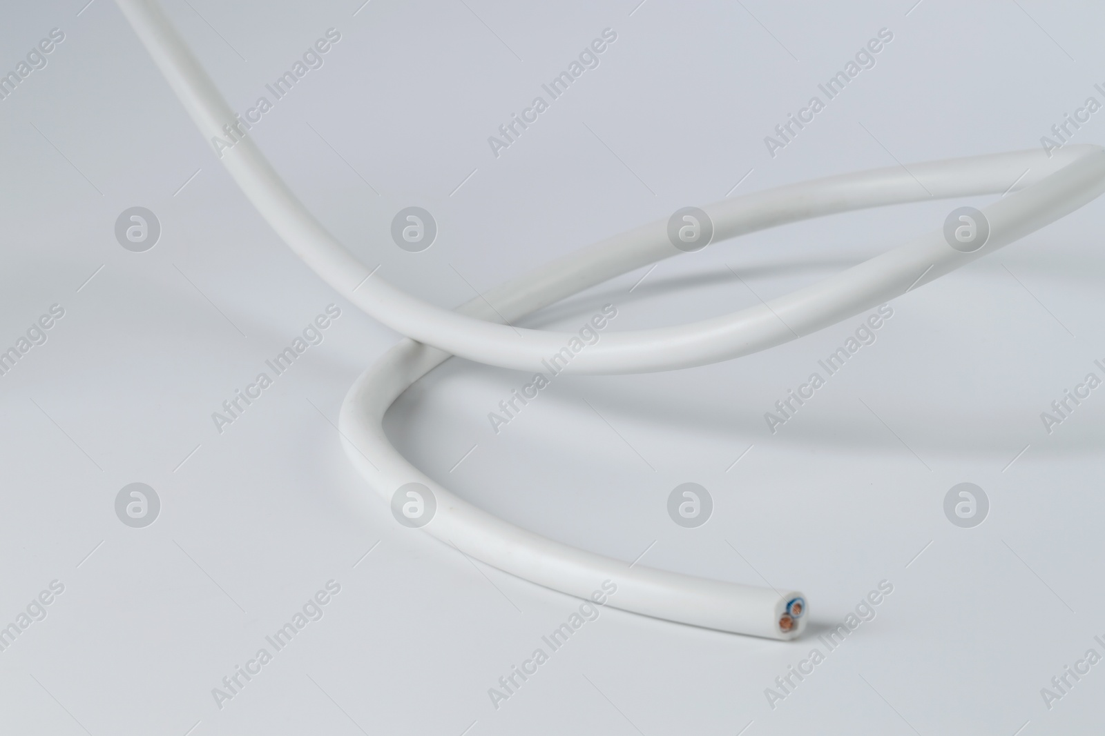 Photo of One insulated electrical wire isolated on white