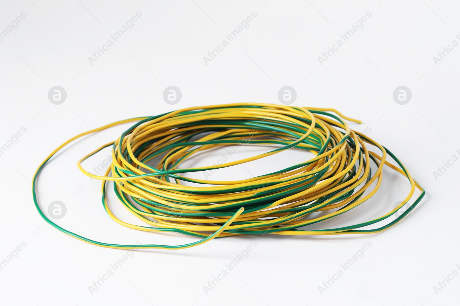 Photo of Insulated colorful electrical wire isolated on white