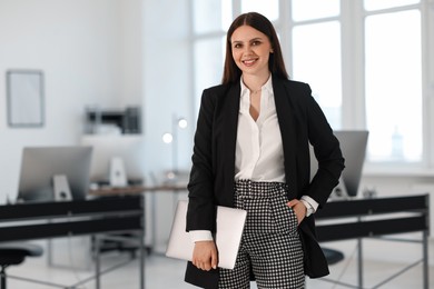 Photo of Banker with laptop in office, space for text