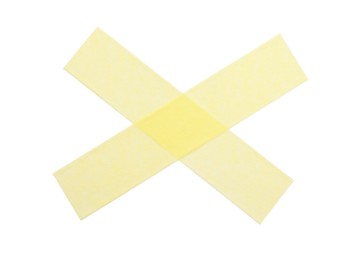 Photo of Cross made with masking tape isolated on white, top view