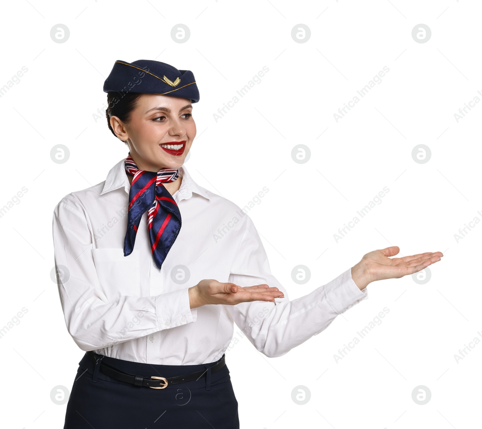 Photo of Smiling stewardess showing something on white background