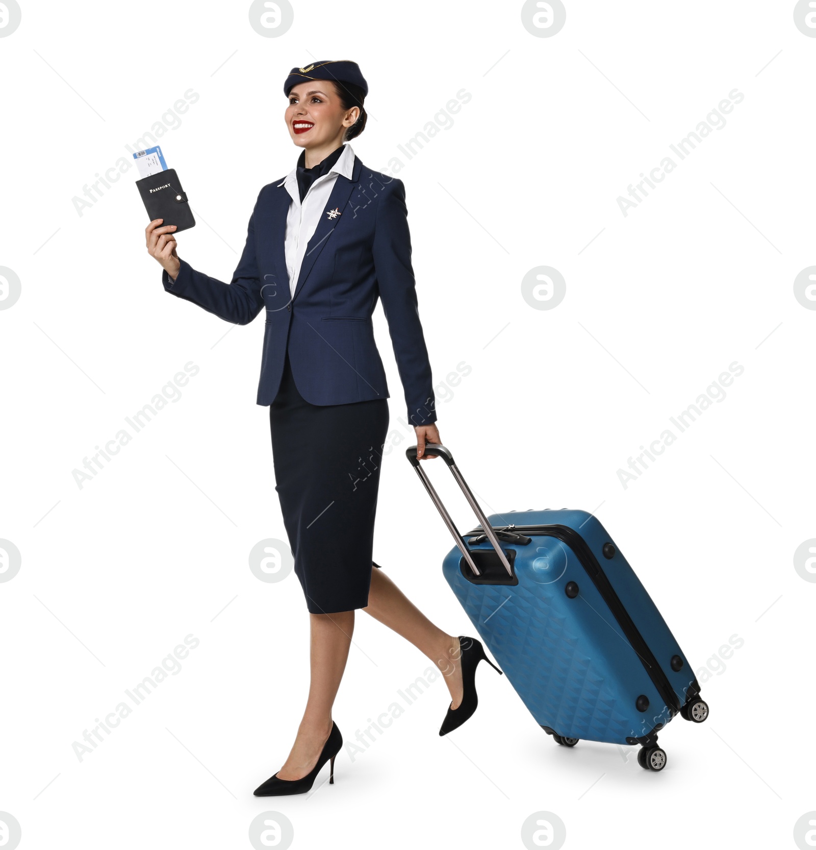 Photo of Happy stewardess with suitcase, passport and flight ticket on white background