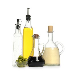 Photo of Salad dressings and olives isolated on white