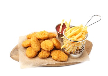 Photo of Tasty chicken nuggets, potato fries and ketchup isolated on white