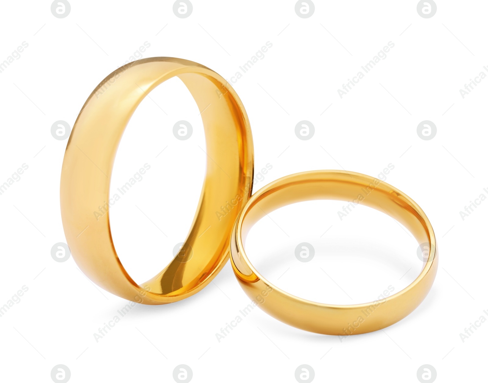 Photo of Beautiful golden wedding rings isolated on white