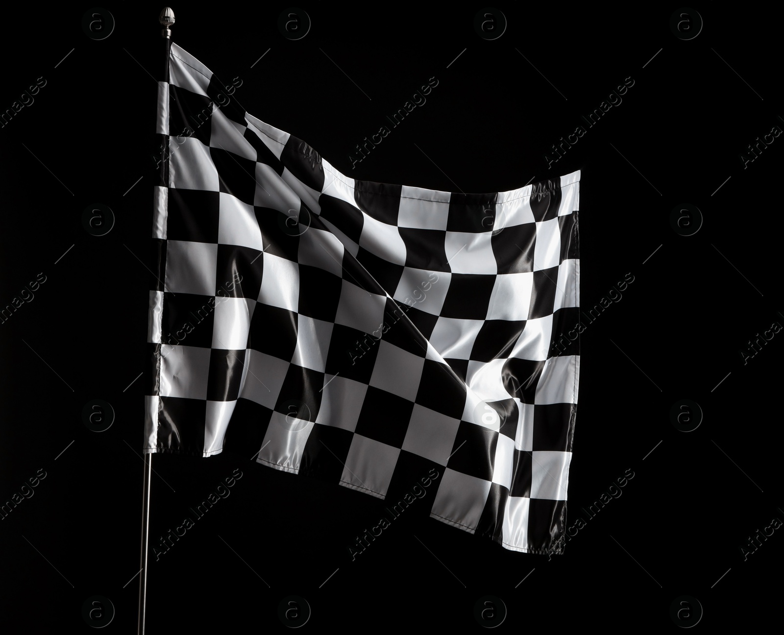 Photo of One racing checkered flag on black background