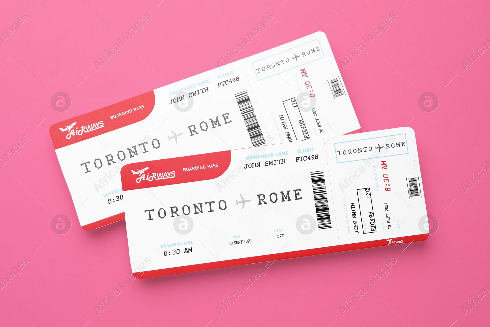 Photo of Travel agency. Flight tickets on pink background, top view