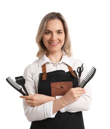 Photo of Smiling hairdresser with combs, hair dye brush and scissors on white background