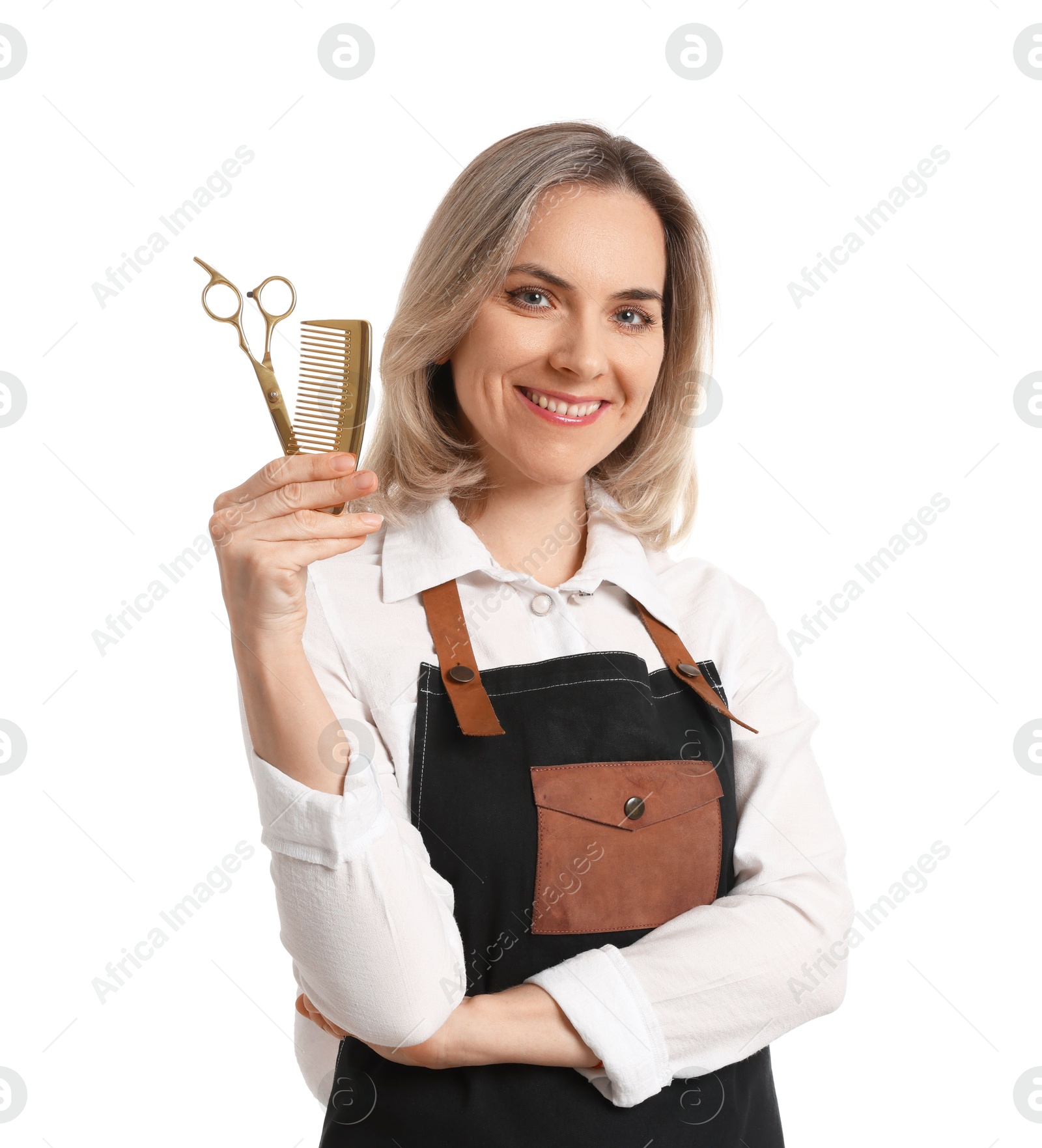 Photo of Smiling hairdresser with scissors and comb on white background