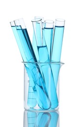 Photo of Test tubes with blue liquid isolated on white