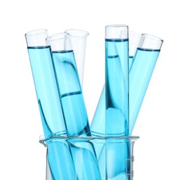 Photo of Test tubes with blue liquid isolated on white