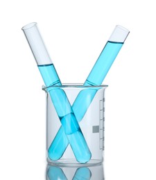 Photo of Test tubes with blue liquid isolated on white