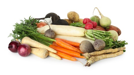 Photo of Many different root vegetables isolated on white