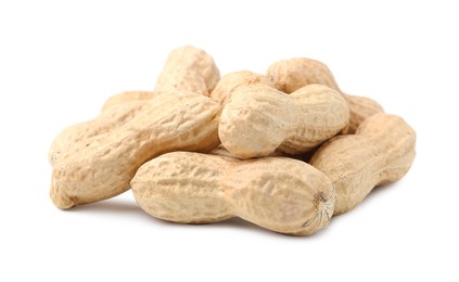Photo of Pile of unpeeled peanuts isolated on white