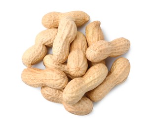 Photo of Pile of unpeeled peanuts isolated on white, top view