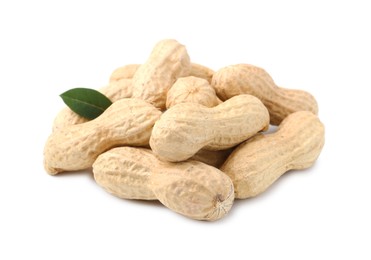 Photo of Pile of unpeeled peanuts isolated on white