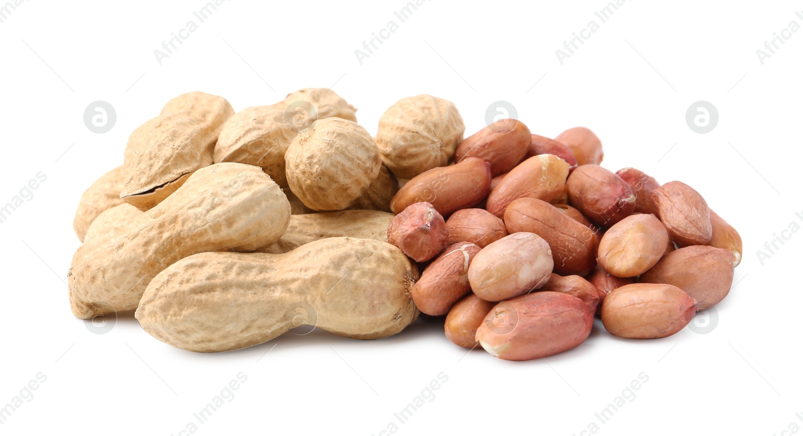 Pile of different peanuts isolated on white Photo of Pile of different peanuts isolated on white