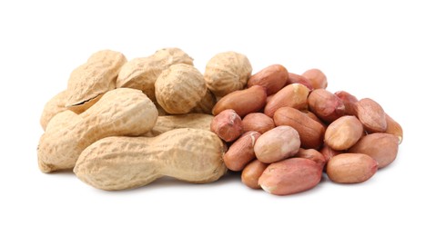 Photo of Pile of different peanuts isolated on white