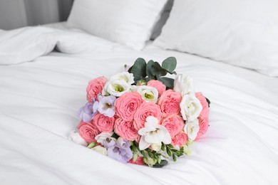 Photo of Wedding bouquet of beautiful flowers on bed