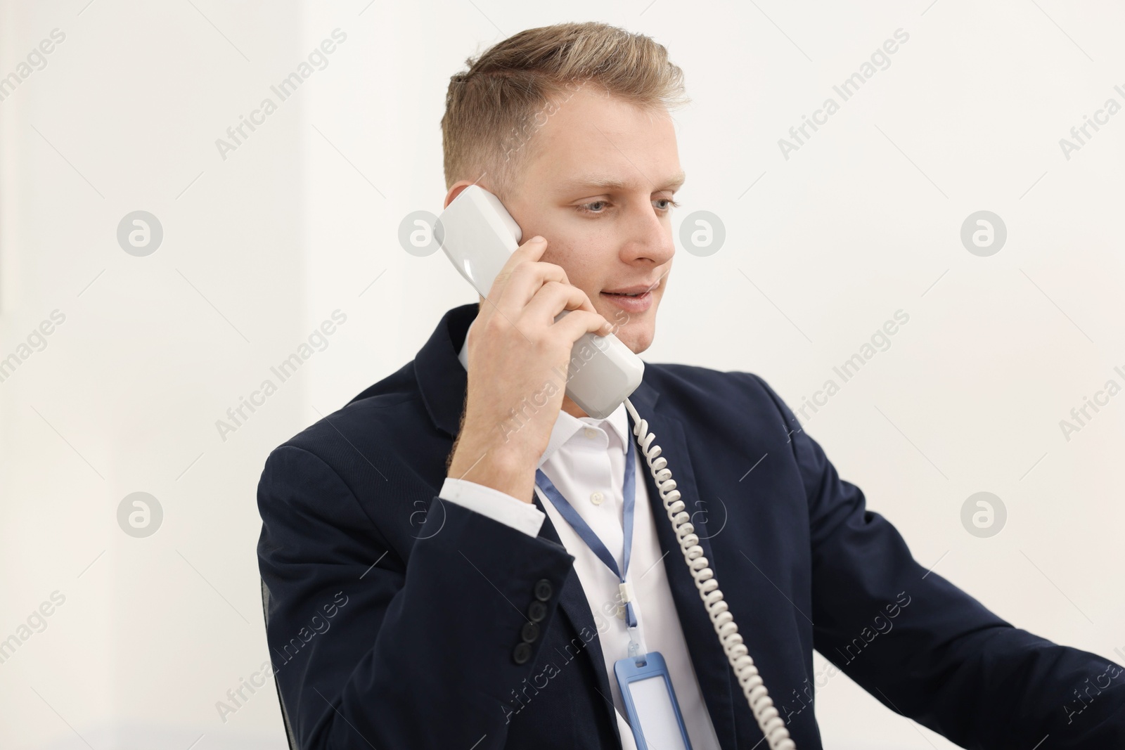 Photo of Technical support call center. Operator working in office