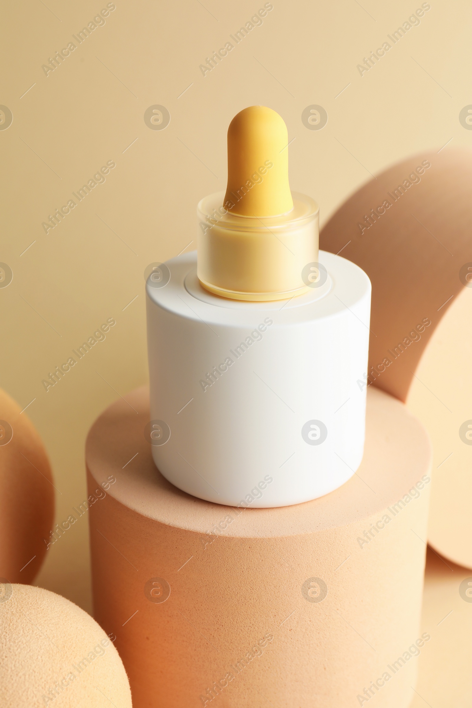 Photo of Stylish presentation of skin care product on beige background