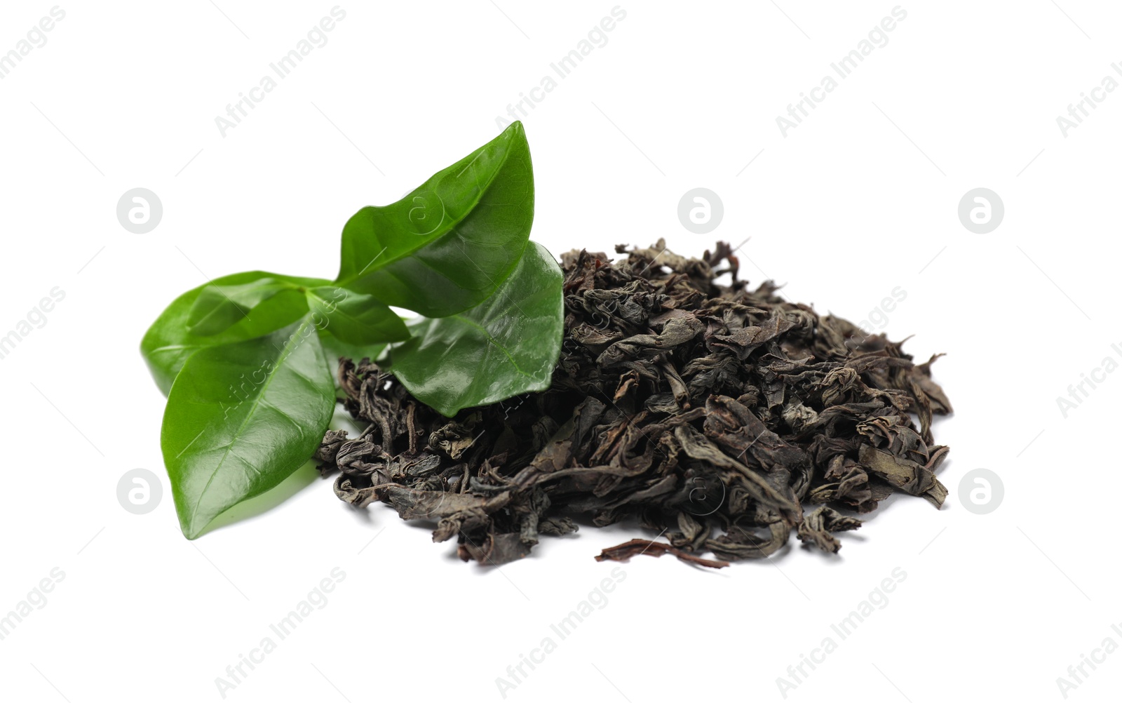 Photo of Pile of dried tea leaves isolated on white