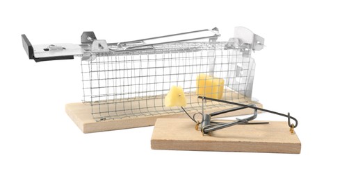 Photo of Two mouse traps with cheese isolated on white