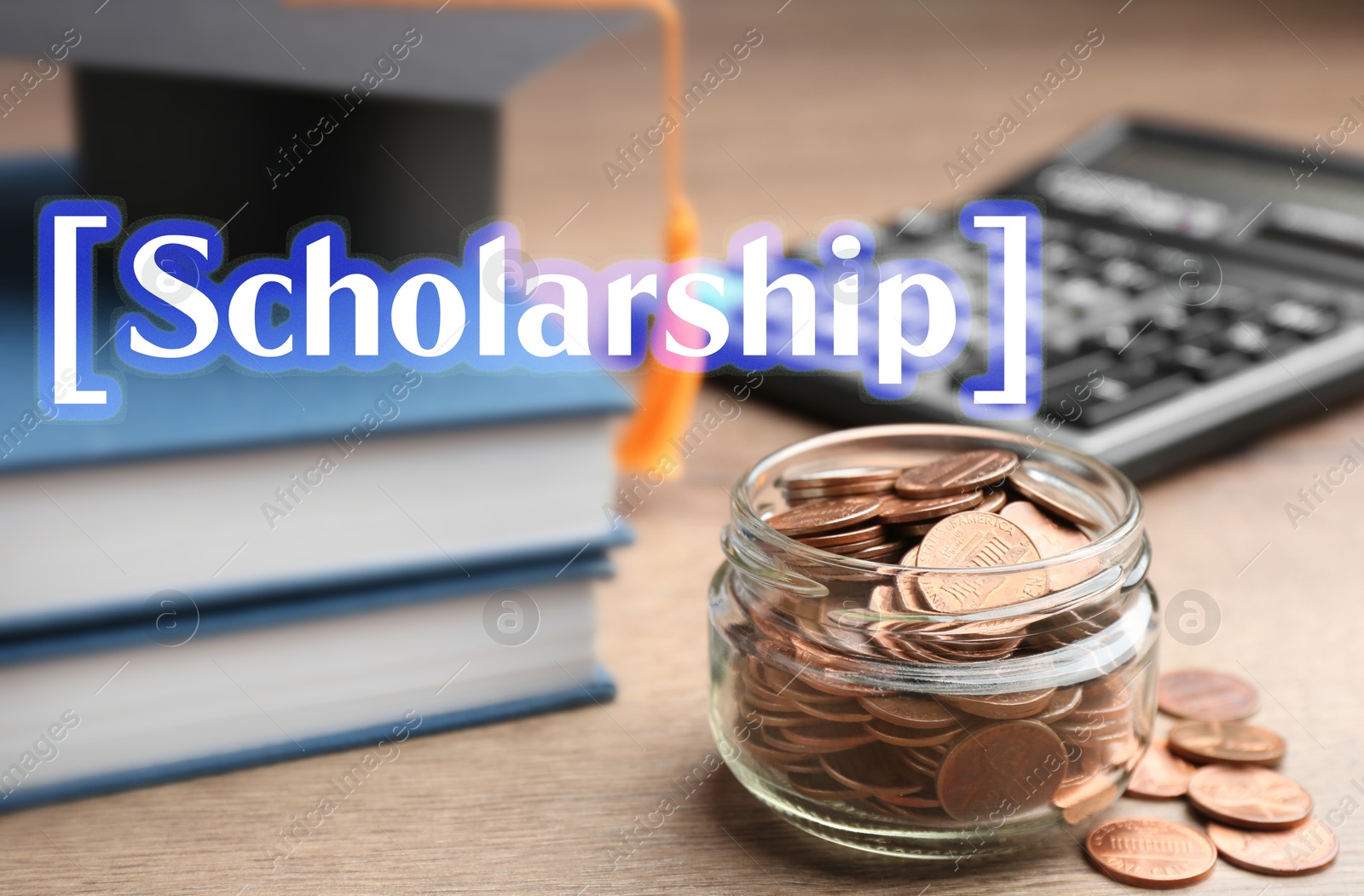 Image of Scholarship. Jar of coins, books, graduate hat and calculator on wooden table